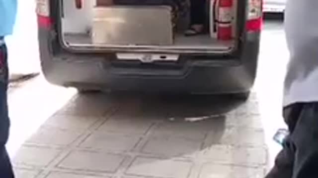 The Patient is waiting in the Philippines while the doctors are standing around talking