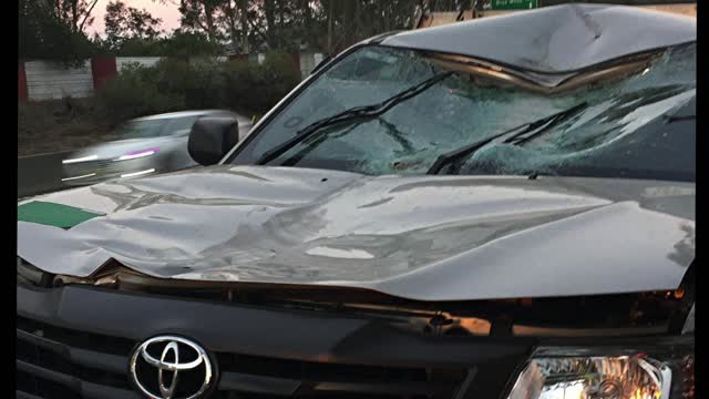 Beer Keg Slams Car