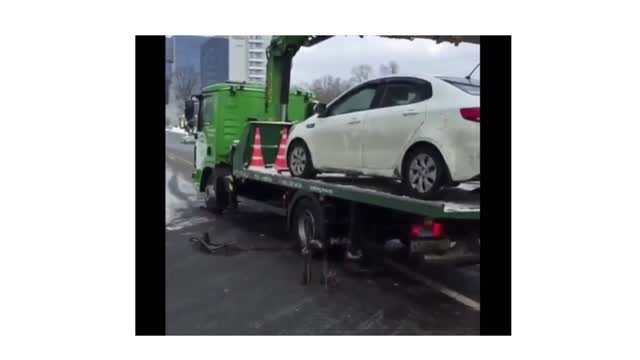 Tow truck. The car moved off the tow truck.