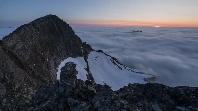 sunset near mountain topp with inversion