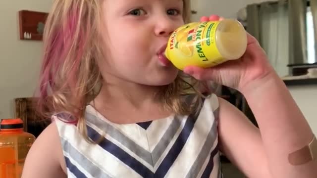 Little Girl tries Lemon Juice