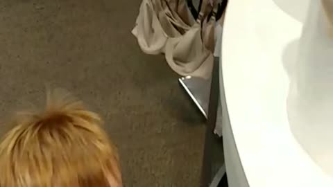 Boy Gives Dad Anatomy Lesson While Shopping