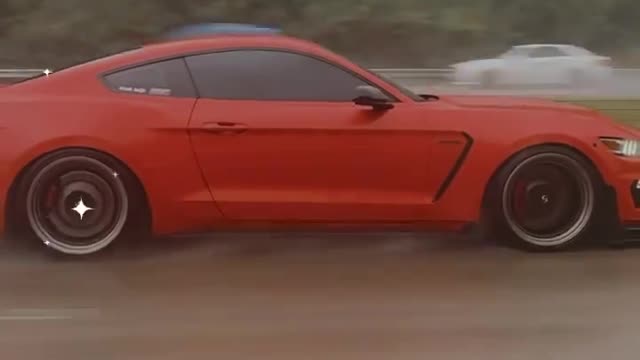 Dodge challenger driving through the rain