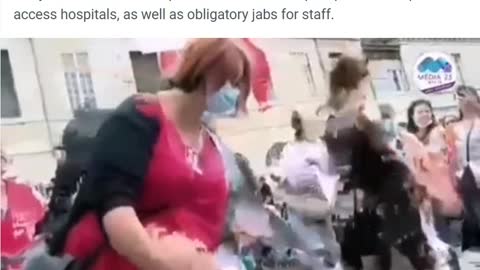 Paris medical professionals rip up their licenses and throw their white coats on the ground