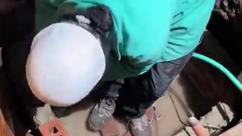 Woman is building an underground tunnel system under her house by hersel