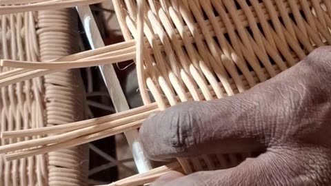 Rattan on wrought panelist weaving.