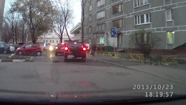 Police Knock Over Biker In Traffic