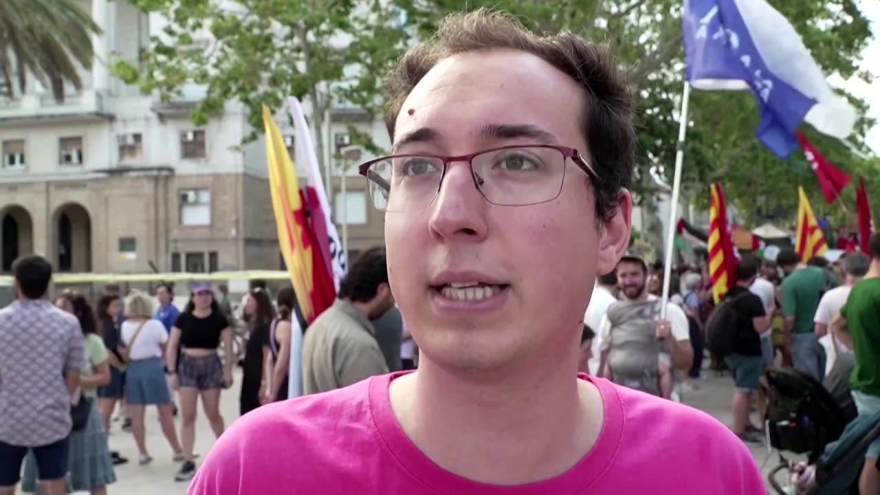 Protesters in Barcelona tell tourists to go home