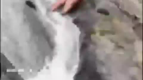 chicks slips and slides down rock waterfall