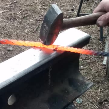 Black smithing twisting metal part 3