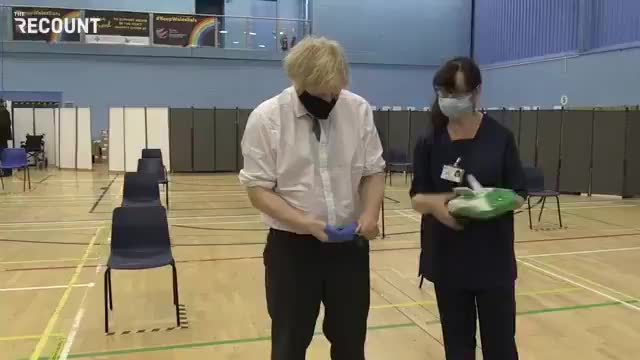 Psycho blojo struggling to put on gloves