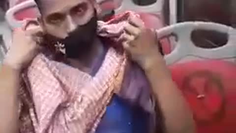 Man Hijab in bus