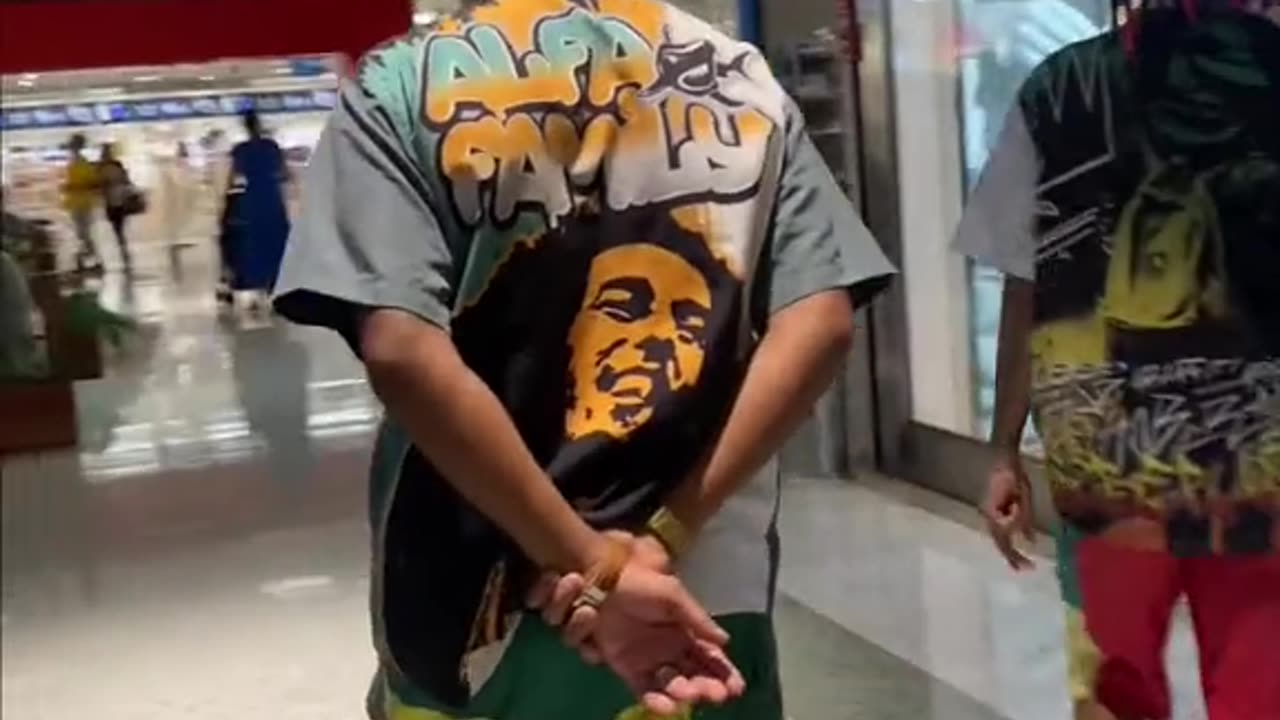 Entering mall like gangster