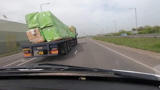 Precarious Load Leaning off Truck