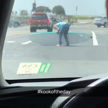 #kookoftheday guy picks surfboard out of road and puts in van