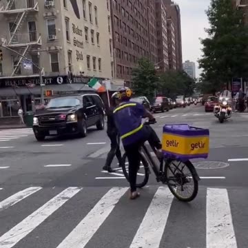 WOW: Cyclist Gets Pushed To The Ground To Make Way For Biden's Motorcade