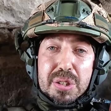 WARNING! A group of Ukrainian soldiers hide from Russian artillery in a shallow bunker...