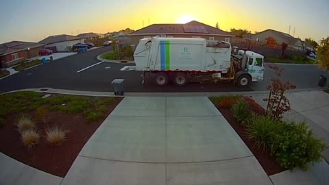 Garbage Truck Uses Robot To Dump Garbage Bin Inside Its Dumpster