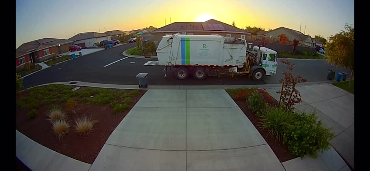 Garbage Truck Uses Robot To Dump Garbage Bin Inside Its Dumpster