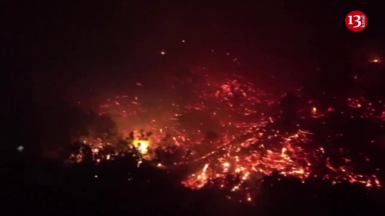 Wildfire in western Spain fanned by wind, rages out of control