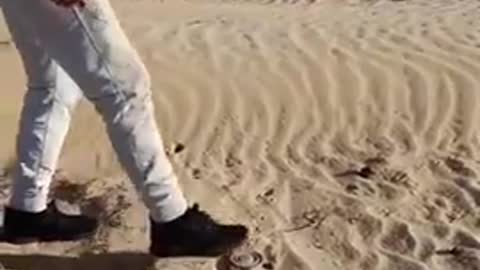 THIS DUDE SEE'S A LANDMINE OUT IN THE DESERT IN SYRIA. SO HE STEPS ON IT TO SEE IF IT IS REAL...