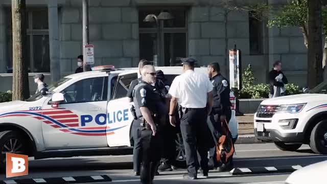 Climate Activist Arrested After Scaling D.C. Mayor's Office Popping Smoke Flare.