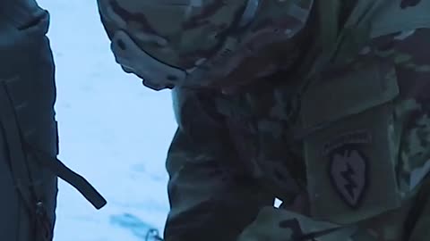 Military: Use of tools in the snow (sled)