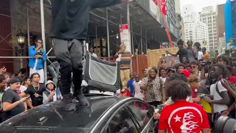 Man Dances on Top Of Car at Kai Cenat Meetup