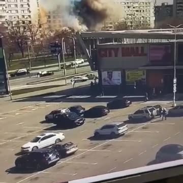 President Zelensky posts a video of a Russian missile hitting a residential high-rise.
