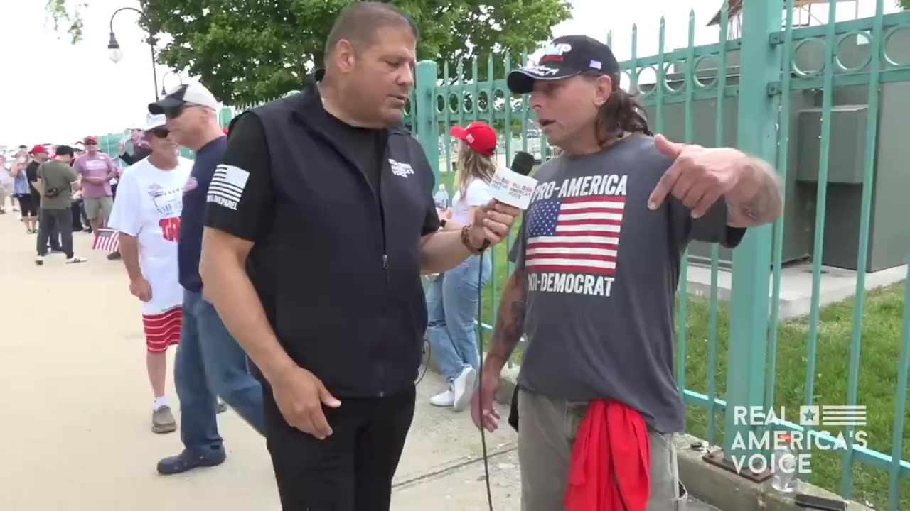 RAV correspondent, David Zere talks with rally goer Todd Mascaretti