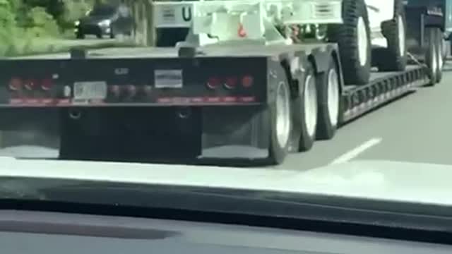 Armored UN trucks on highway in Charleston SC.