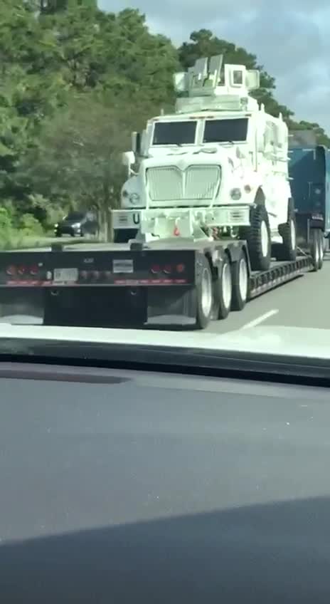 Armored UN trucks on highway in Charleston SC.