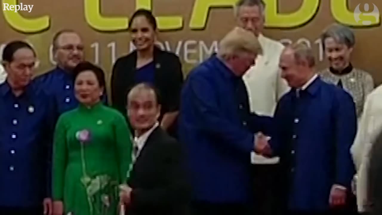 Donald Trump and Vladimir Putin shake hands at Apec - The Guardian