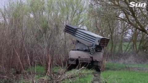 Ukrainian soldiers fire grad rockets from Kharkiv region