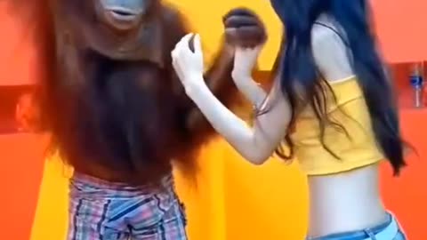 Gorilla kisses pretty girl passionately