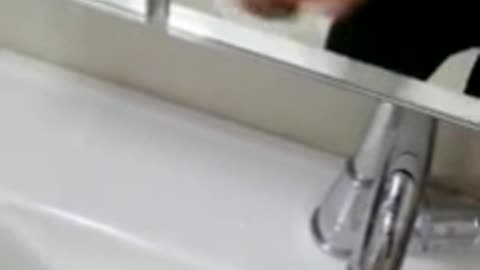 The water flows back into the faucet