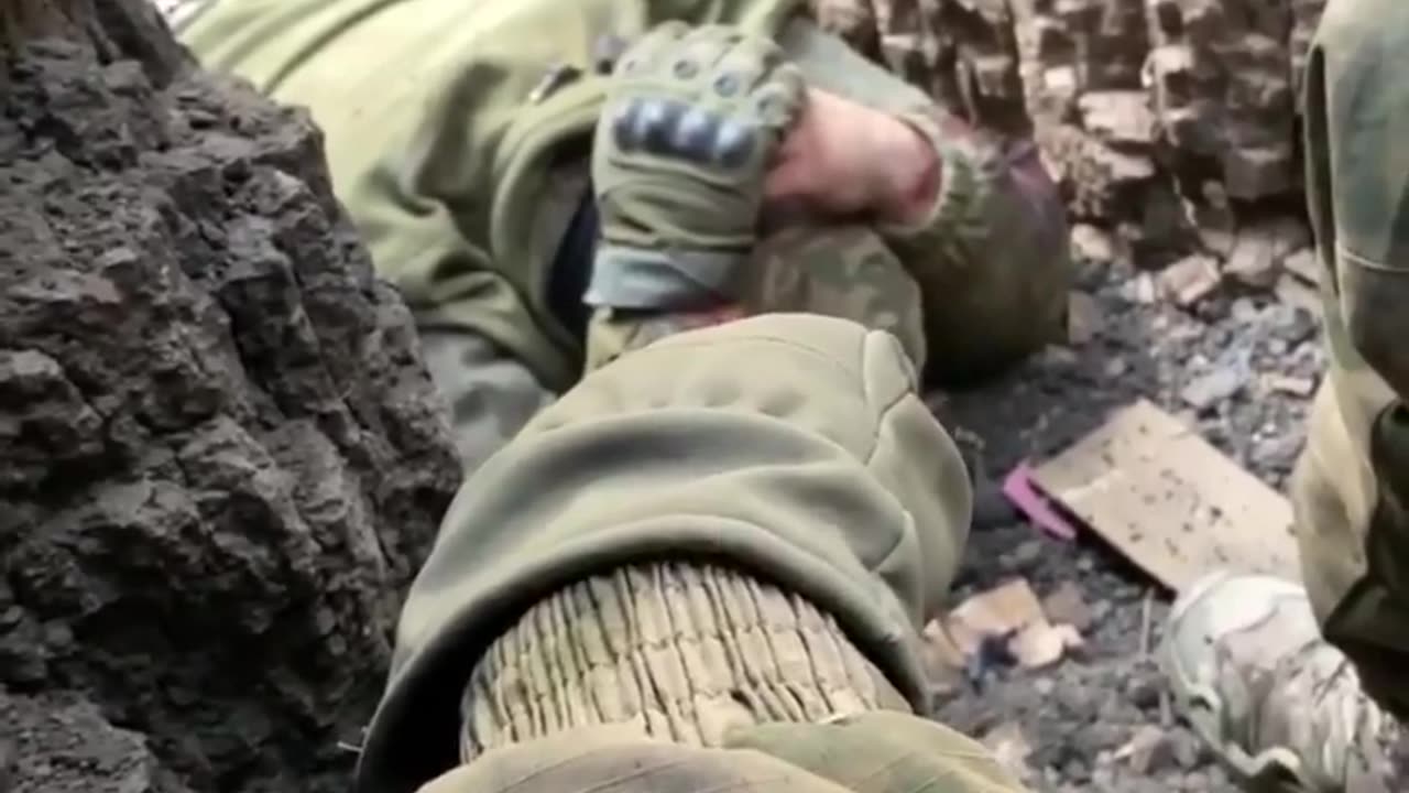 In Avdeevka, a Russian soldier asks a surrendering Ukrainian.