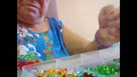 Grandma making Cross