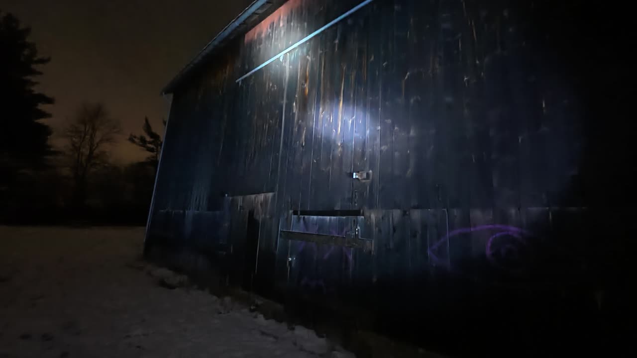 Walk around the Haunted Barn at night with a peek inside