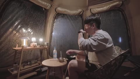 Feel the peace brought by camping in the rain. Bu