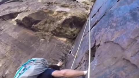 Rock climber gets passed 275 feet off the ground by a free solo climber!