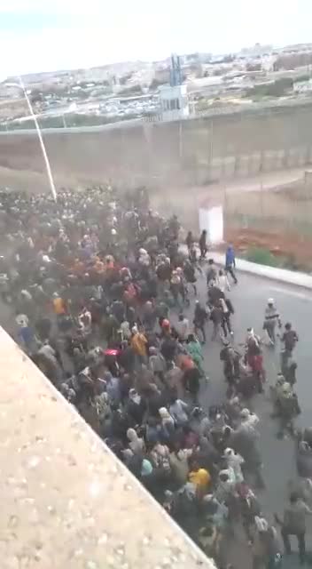 Invasion: Thousands of African men storming the Spanish enclave of Melilla