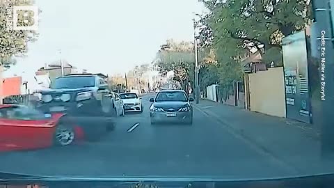 DASHCAM: A red Ferrari collided with multiple vehicles in Melbourne, Australia on Sunday.