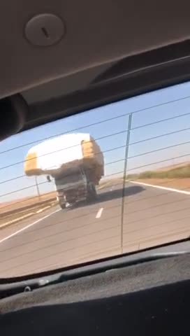 Over loaded lorry in Moroccan motorway