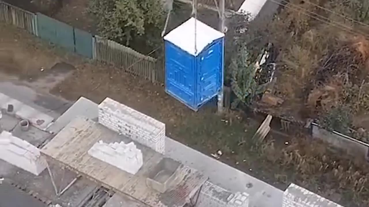 A funny case at a construction site. The builder in the toilet