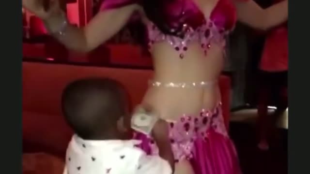 Kid Gives Belly Dancer a Gift