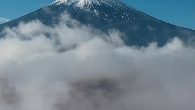 Aerial viewvideo by drone of Mount Fuji and mist at yamanashi Japan