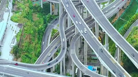 THE NEW ROAD JUNCTION IN GUIZHOU CHINA~IT’S LAID FROM THE MOUNTAIN & ALL ROADS ARE AT DIFFERENT LEVELS IN HEIGHT