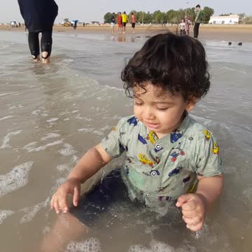 Little boy swimming in the sea