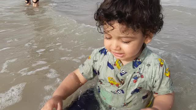 Little boy swimming in the sea